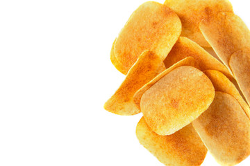 Tasty crispy potato chips on white background. Fast food snack. Copy space.