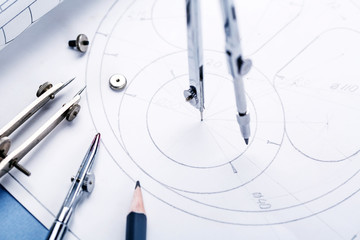 Compass on the details of the industrial drawing
