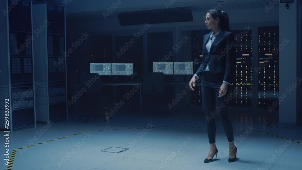 Poster in modern data center research laboratory beautiful confident woman does virtual reality activating 