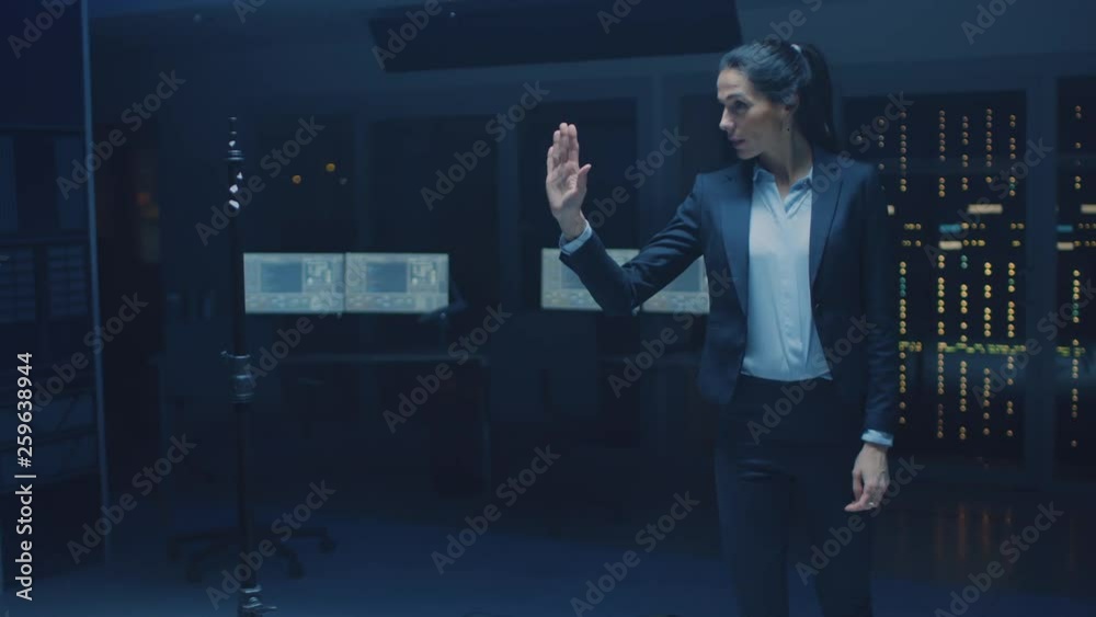 Aufkleber in modern data center research laboratory beautiful confident woman does virtual reality activating 