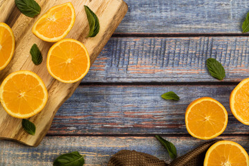 Sweet oranges on a blue wood table 