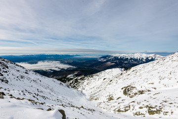 Fototapeta na wymiar snow covered mountain peaks and tourist trails in slovakia tatra