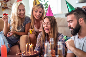 Group of friends having birthday party