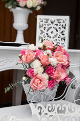 Vintage style tables for decoration of parties and events decorated with natural flowers
