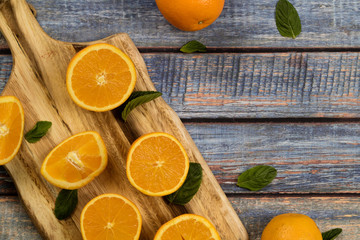 Sweet oranges on a blue wood table 