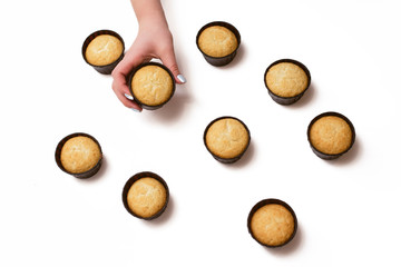 many muffins without cream on a white background