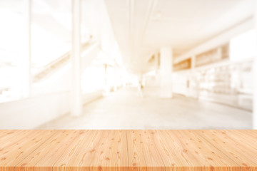 Perspective empty pine wooden table on top over blur background, can be used mock up for montage products display or design layout.
