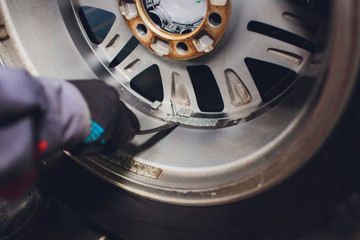 Wheel weights for balancing tires arrayed in trays for precise balance.