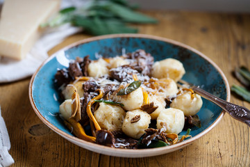 Homemade italian gnocchi with wild mushrooms