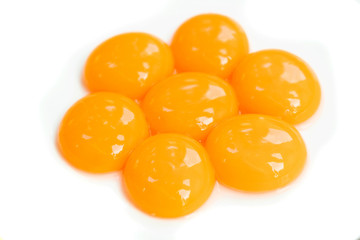 raw egg yolk isolated on white background. Health concept