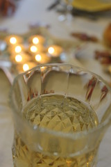 glass of champagne and candlelight