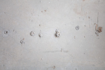 Formwork traces on concrete. Repair and construction or constructing. Concrete background. Grey color. Cement texture. Poor quality curve wall. Flaws, defects and cracks in the wall. .