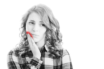 white and black Full isolated picture from young woman with toothache with red spot. - obrazy, fototapety, plakaty