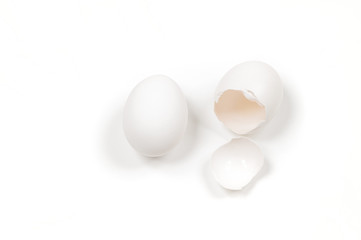 White egg and yolk.. Raw eggs on white background.