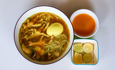 Soto ceker or chicken feet soup on white background. 