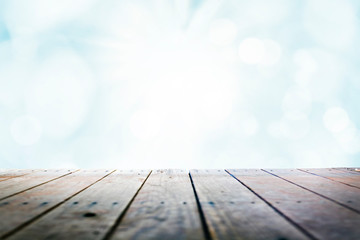 Sunny blue sky over wooden deck background