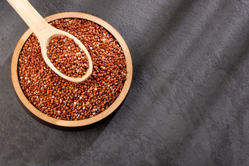 Red seeds of organic quinoa - Chenopodium quinoa. Top view