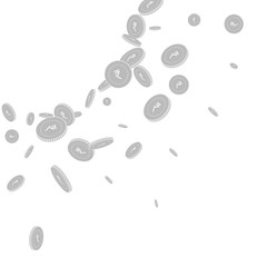 Indian rupee coins falling. Scattered black and wh