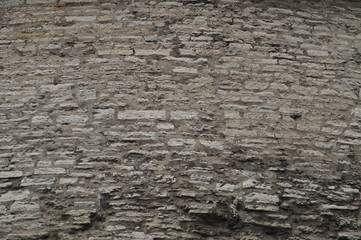 Old stone wall masonry texture background