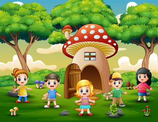Happy kids playing on the fantasy house of mushroom