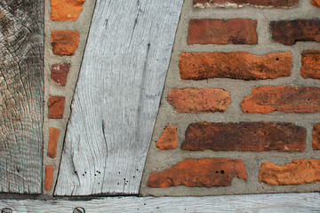 Old brickwall with wood