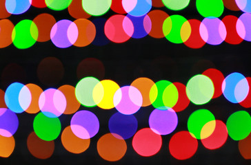 Multi-colored Bokeh on dark background.