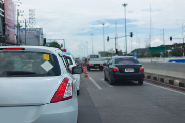 car on road traffic jam with blank sign sticker on back for design your text