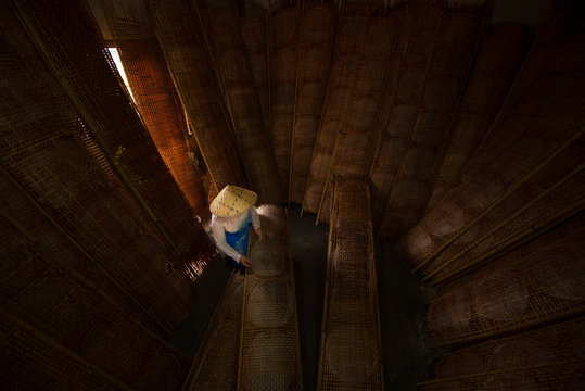 Top view Vietnamese woman make rice paper for Vietnam food