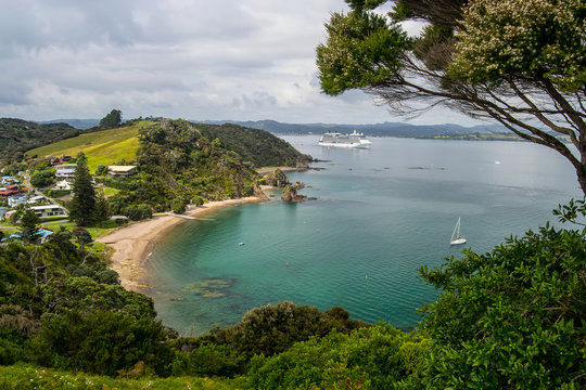 Coastline view from Tapeka Point Track with blue sky above in Russell, Northland, New Zealand