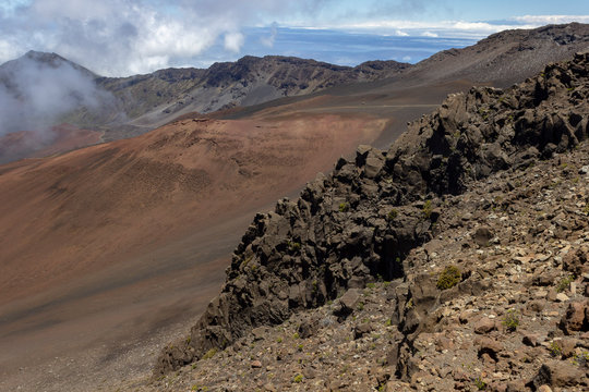 View of Haleakala crater with clouds in background, Maui Hawaii