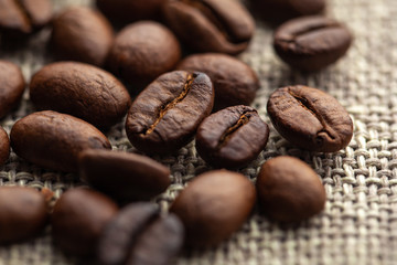 Close up of coffee beans on cloth sack
