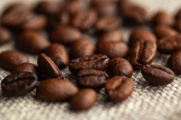 Close up of coffee beans on cloth sack