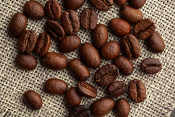 Close up of coffee beans on cloth sack
