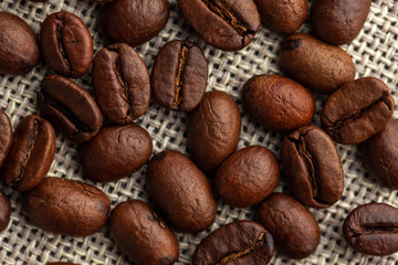 Close up of coffee beans on cloth sack