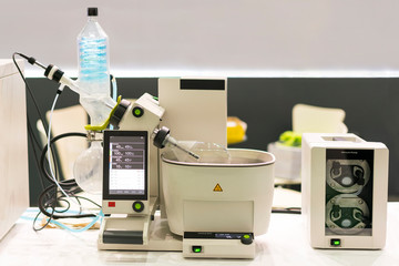 Close up high technology rotary vacuum evaporator with distillation flask in chemical laboratory...