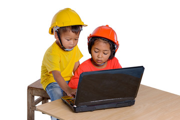 Asian children wearing safety helmet and thinking planer isolated on white background. Kids and education concept