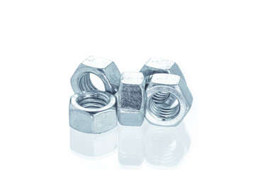 Closeup Bolts, steel screwbolts and nuts Used for capturing workpieces mechanical parts And construction isolated on a white background industrial concept