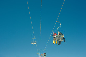 Ski lift on the slop in mountain ski resort
