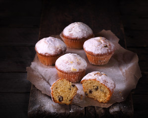 muffins on wooden table