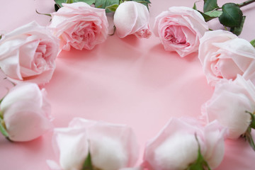 Obraz na płótnie Canvas bouqet delicate pink roses on pink background