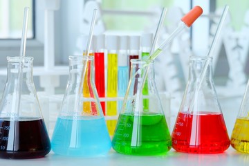 Chemical tube set development and pharmacy in laboratory  with multicolored substances in laboratory - Image