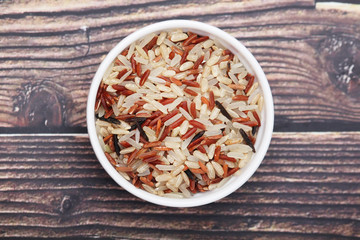 A mixture of brown, white, and red indica rice