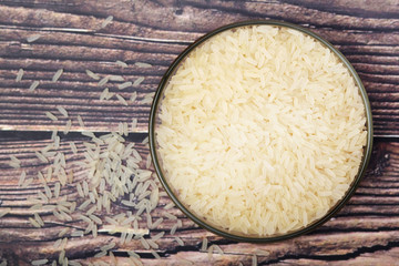 A glass bowl with white long-grain rice