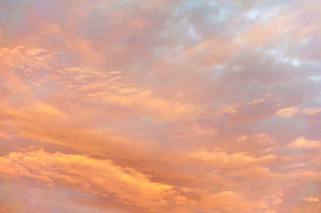 Colorful clouds create an abstract ethereal painterly like mood in the sky