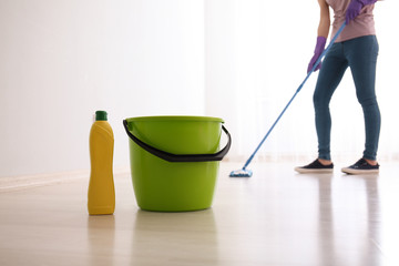 Fototapeta premium Cleaning of floor in room