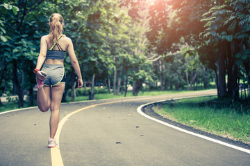 Pretty sporty girl  jogging at park , sport girl concept 