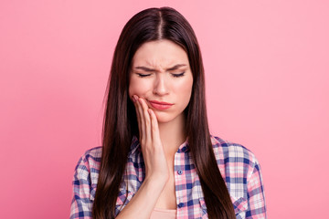 Close-up portrait of her she nice attractive cute charming sad straight-haired lady having pain attack teeth damage painkiller meds closed eyes isolated over pink pastel background