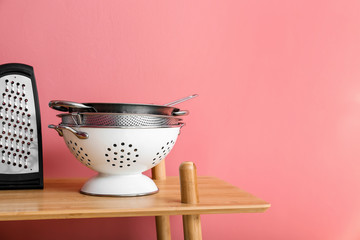 Set of utensils on table in kitchen