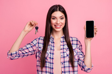 Close-up portrait of her she nice attractive cute charming shine lovely cheerful straight-haired lady holding in hands keys new apartment lifestyle isolated over pink pastel background