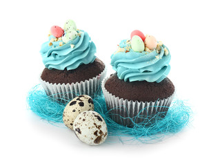 Sweet Easter cupcakes on white background